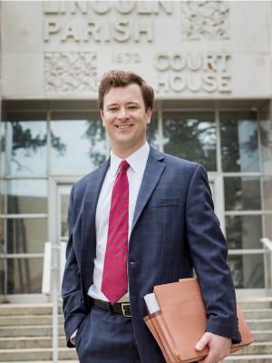 Russell A. Woodard Jr., owner of The Law Office of Russell A. Woodard, Jr., LLC outside the courthouse in Monroe, LA